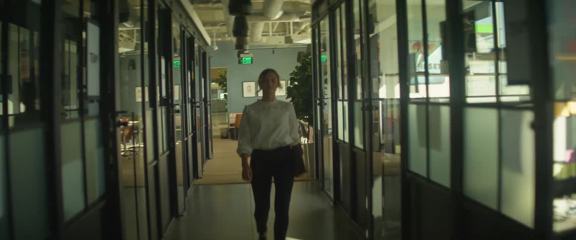 Women walking in an office