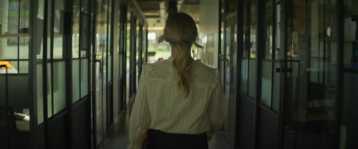Businesswoman walks up to the office canteen
