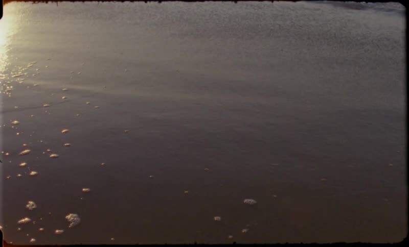 Water washing up on a sandy beach