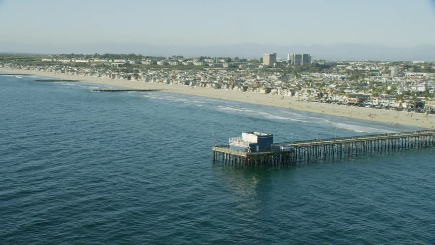 Aerial zoom out reveal of Newport pier