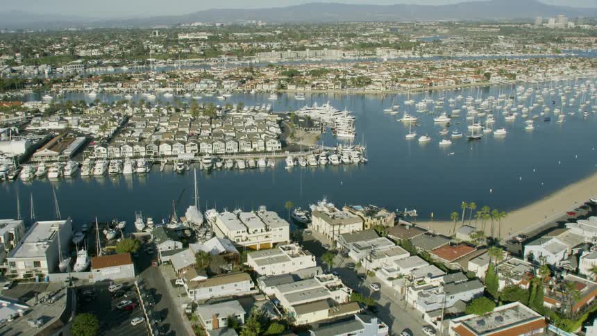 Aerial shot of a wealthy town with houses with boat docks