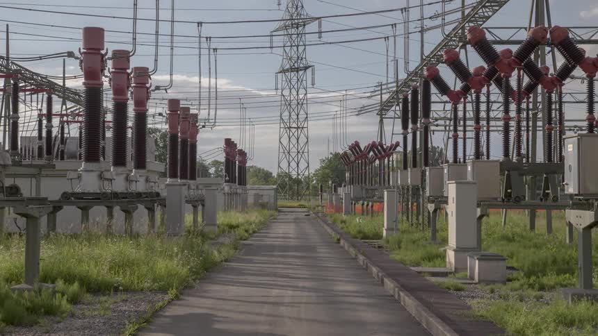 The clouds flow over the power plant