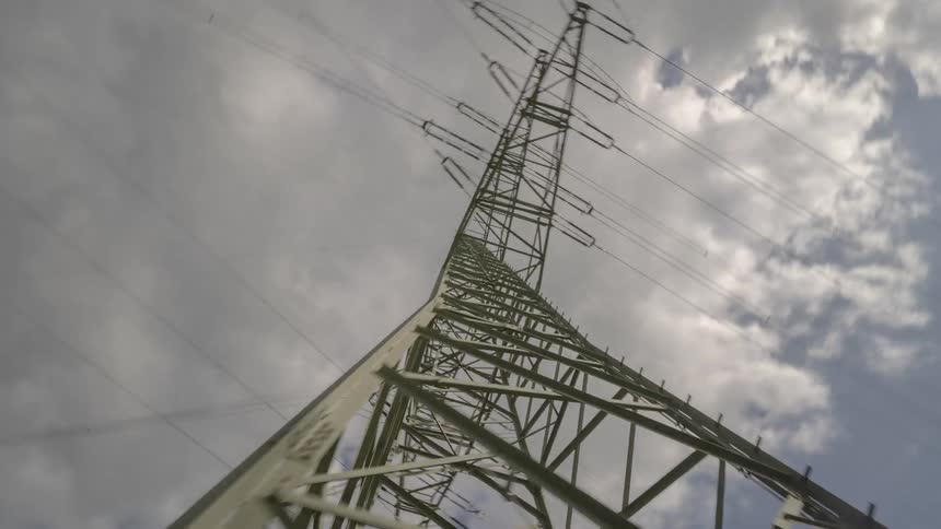 Electrical power lines with the sky up above