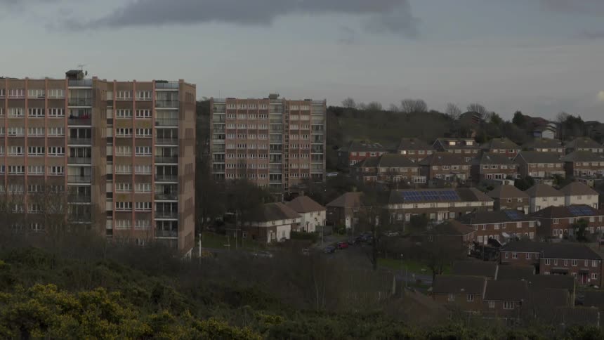 Multi family homes on a hill in a city