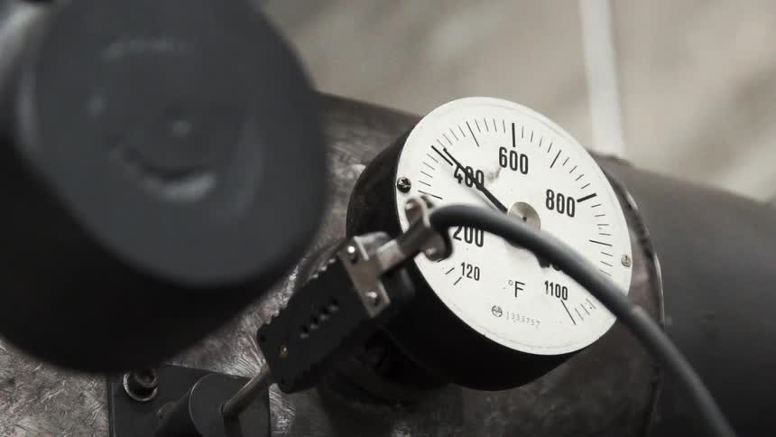 A gauge on the side of a machine is steady