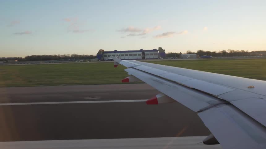 An airplane driving on a landing strip