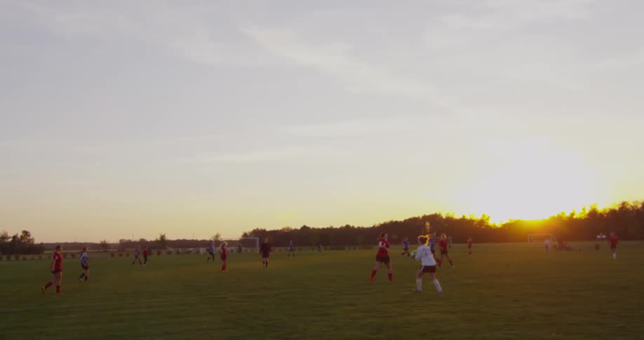 Women playing soccer