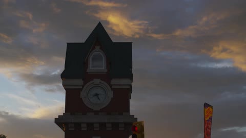 A town clock tower at dusk