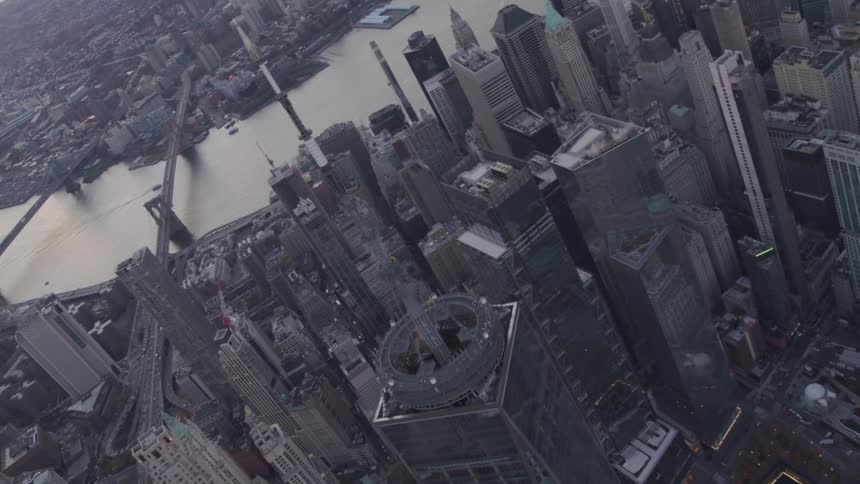 A city with buildings and skyscrapers with bridges in the background