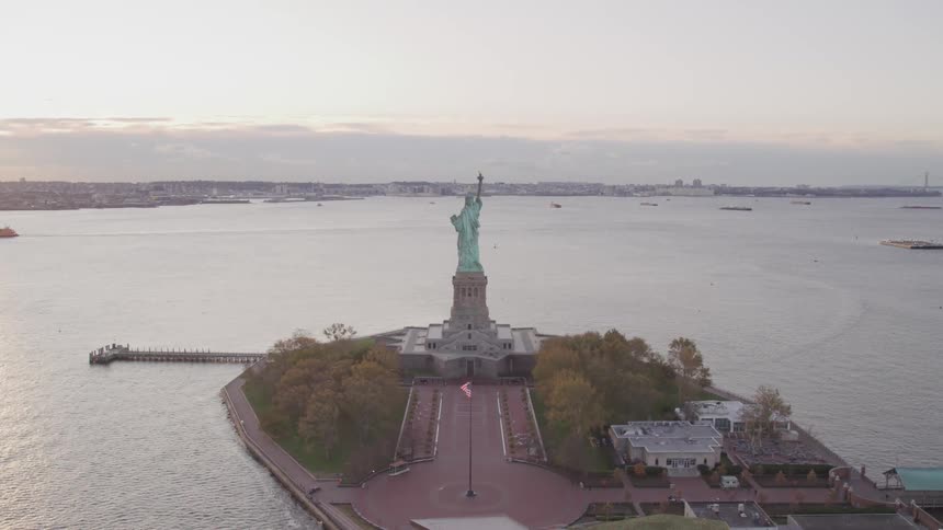 The statue of liberty and surrounding water