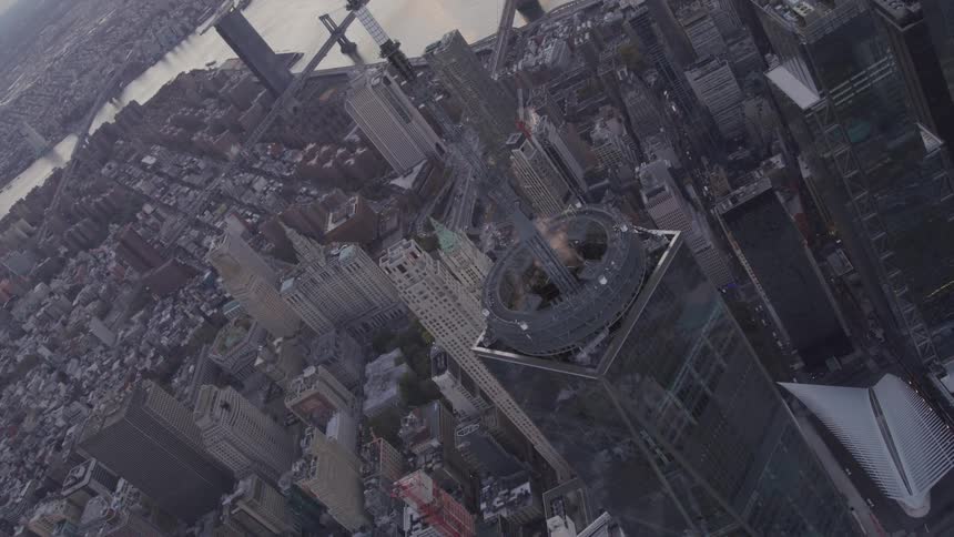An aerial view of an inner downtown city is displayed