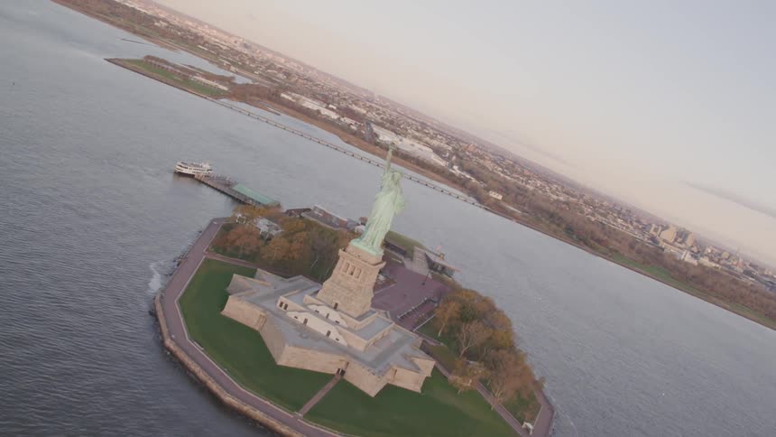 Ferry docked on liberty island for visitors to see the statue of liberty