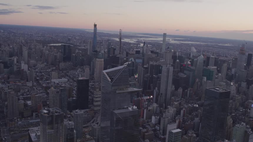 Buildings and skyscrapers of a large city at dusk