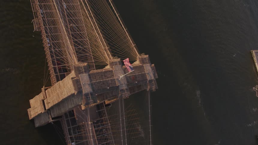 Cars driving across a suspension bridge