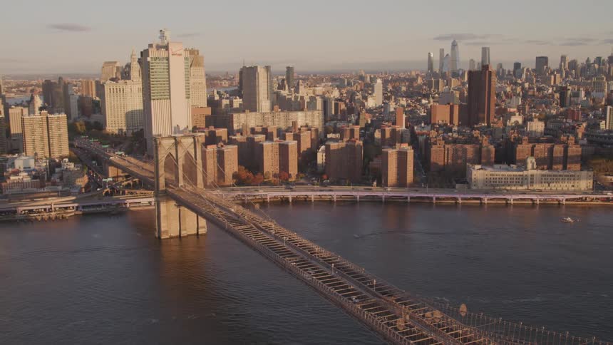The city past the water is covered with large buildings