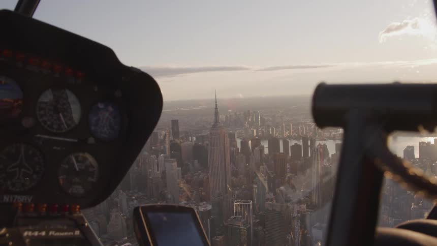 A city skyline shot from inside an aircraft