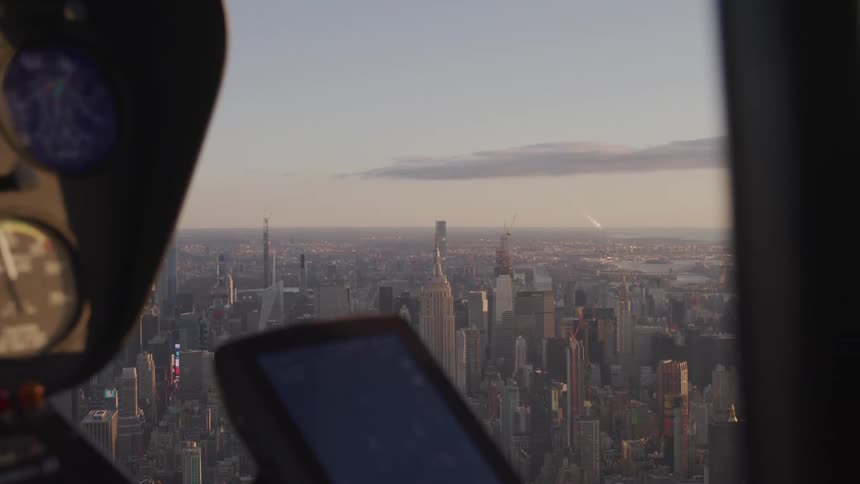 Buildings in a downtown city out of an aircrafts window