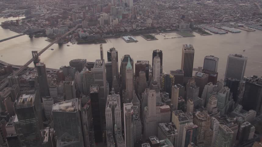 An aerial view of a downtown city is displayed
