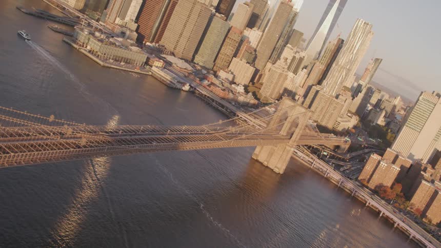 A large bridge leads to the city