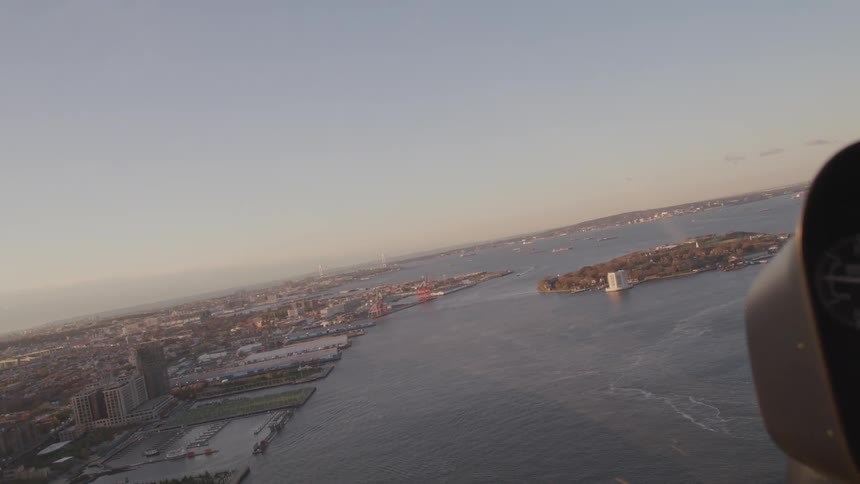 Water separates island and city as ocean stretches to the horizon