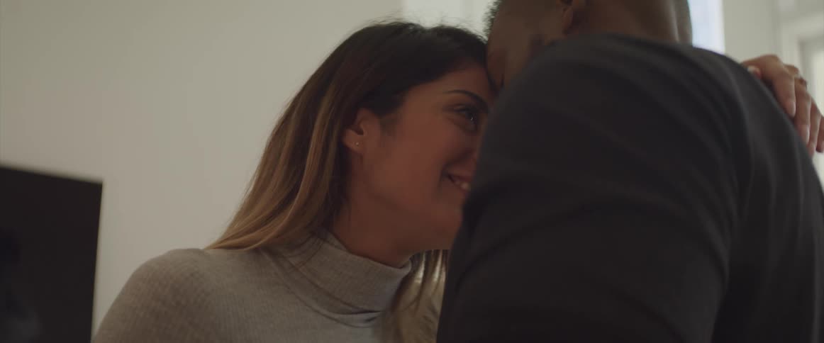 A man and woman dance together