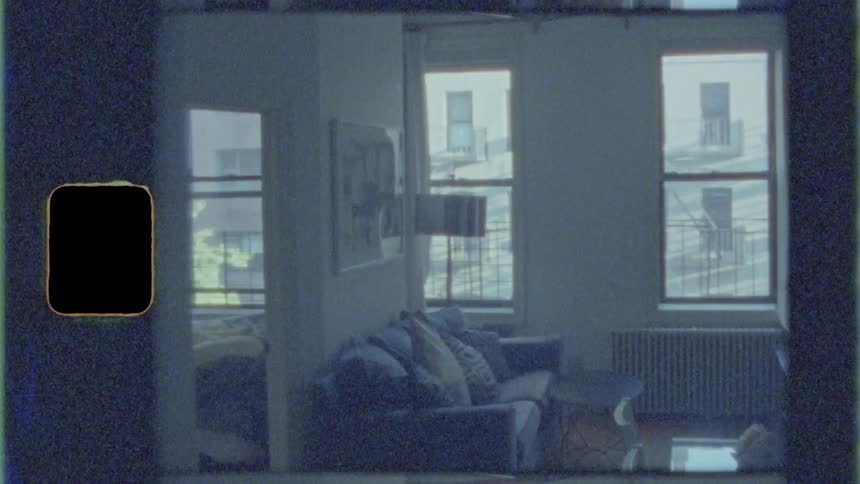 The living room is empty on a sunny day