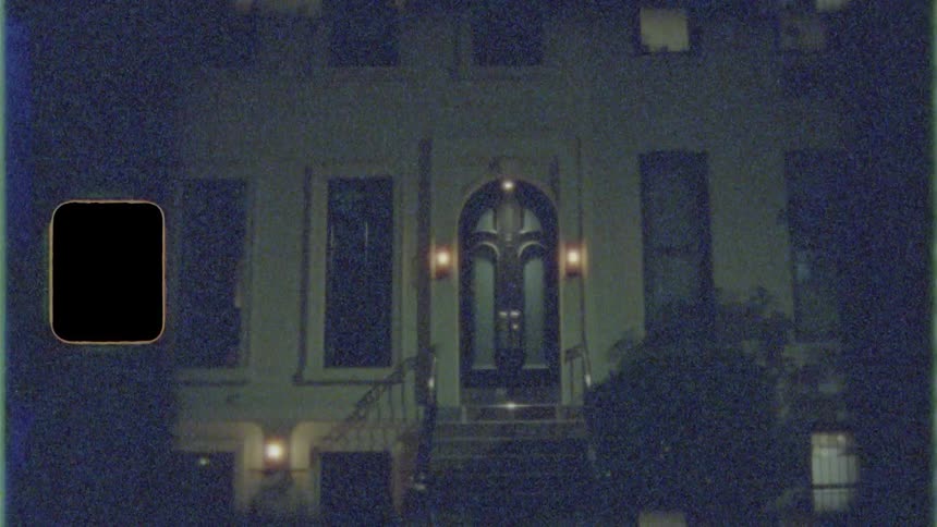 The outside of an apartment building at night