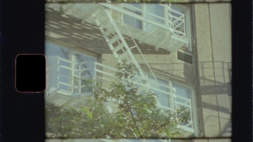 A fire escape on the side of an apartment building