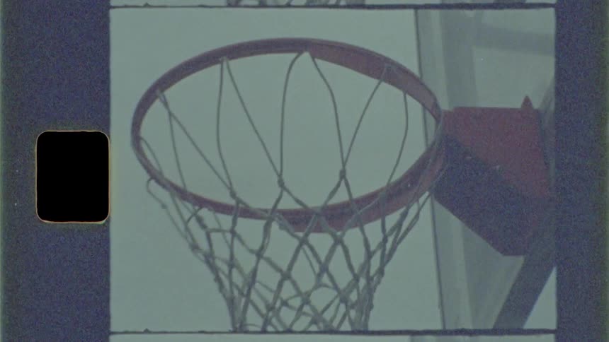 The hoop is empty in the cloudy sky