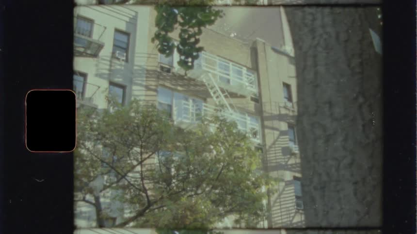 Stairs go up the side of the apartment building