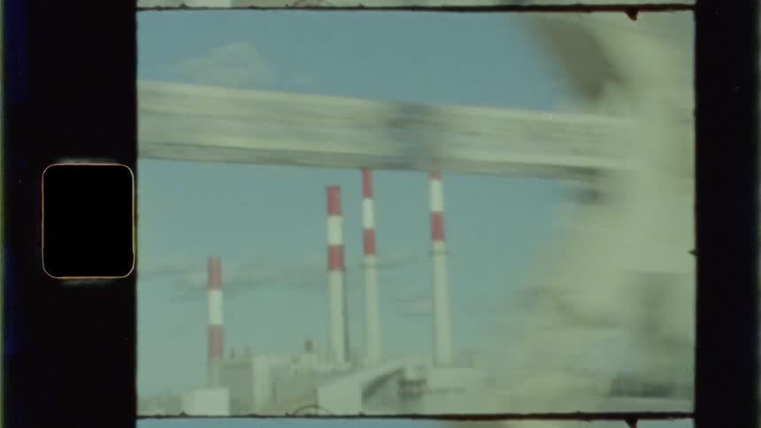 Shot out a window of some kind of fast moving vehicle going over a bridge