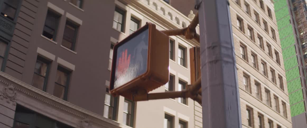 A street sign in front of a building