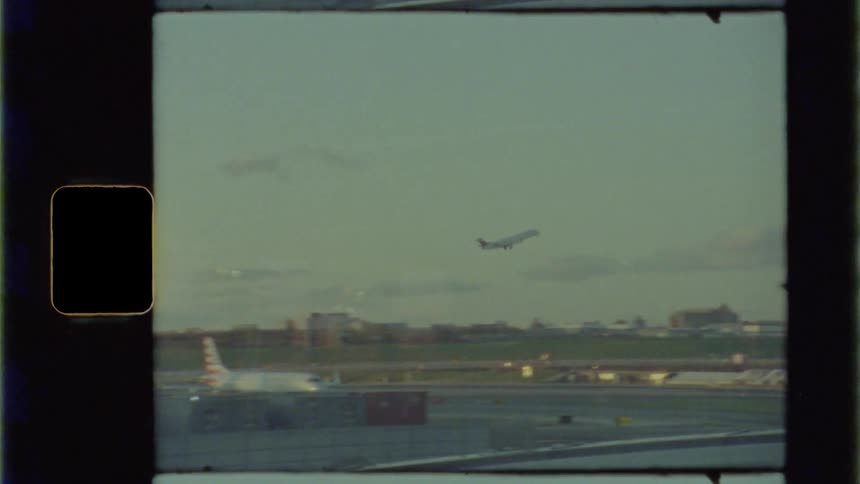 An airplane takes off into the sky from an airport