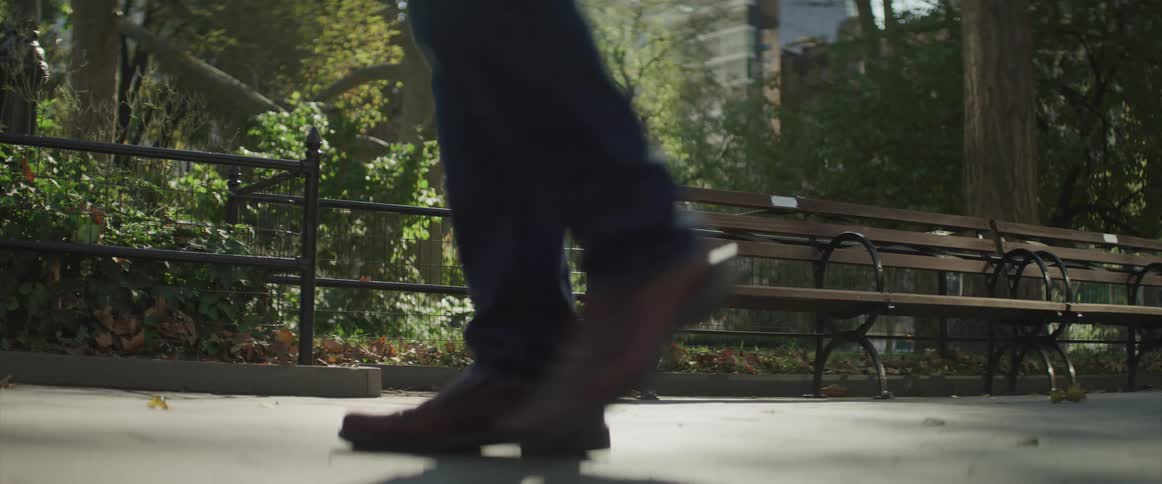 Man walks in the public park