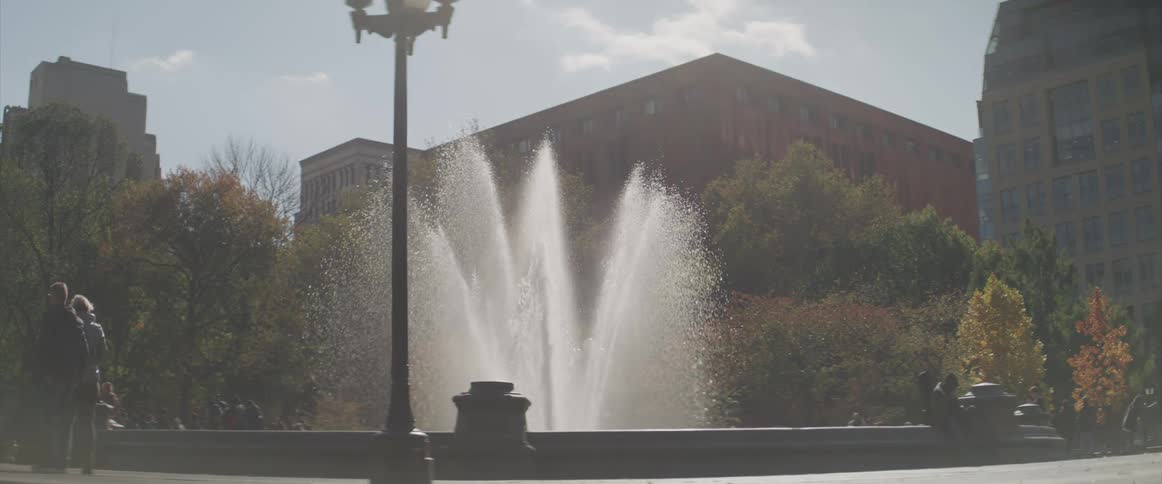 Fountain in the park of city downtown at day
