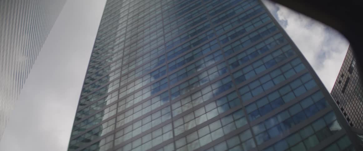High rise buildings tower above a downtown street