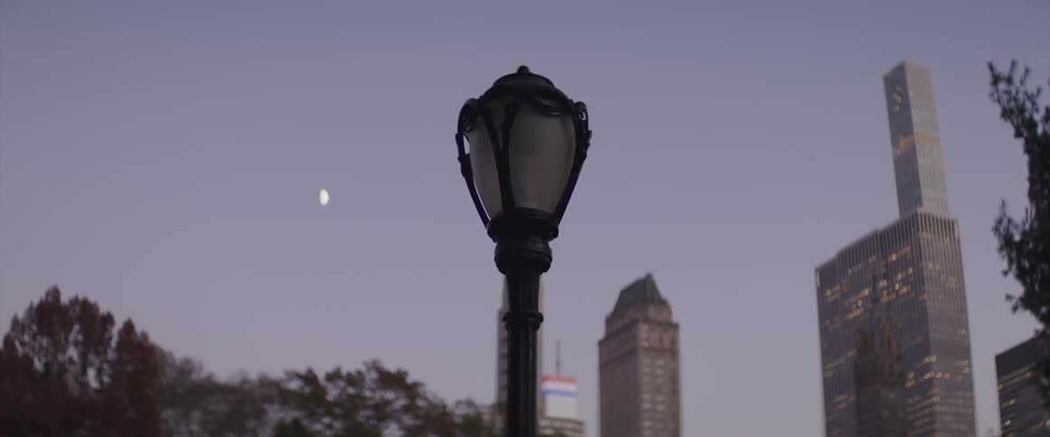 A light pole is off as nighttimes set downtown
