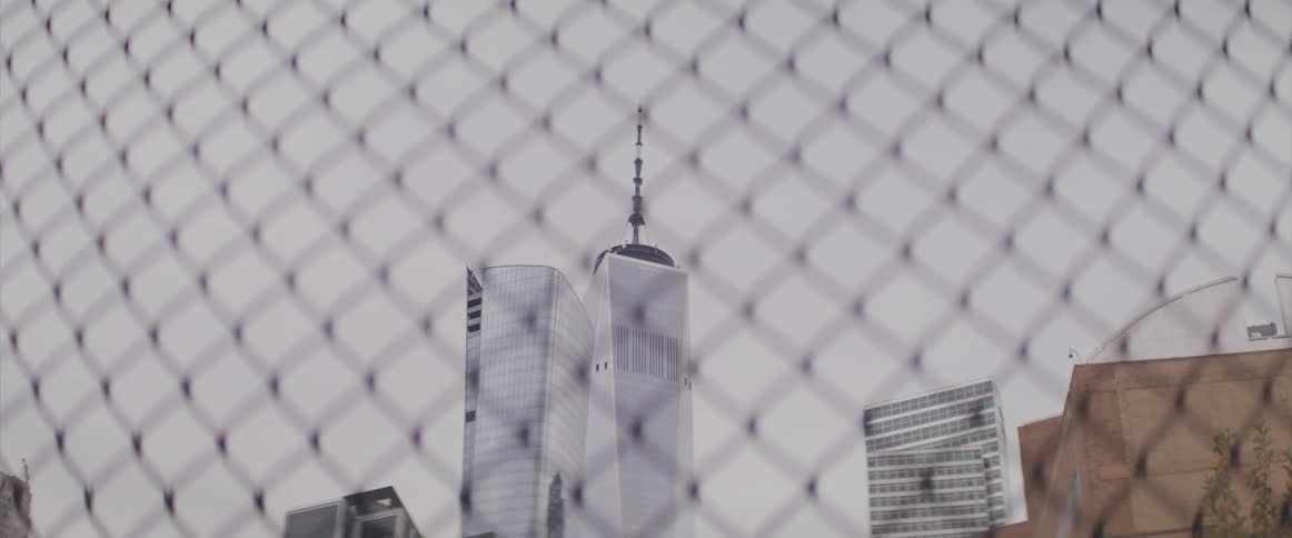 The tops of skyscrapers in a city