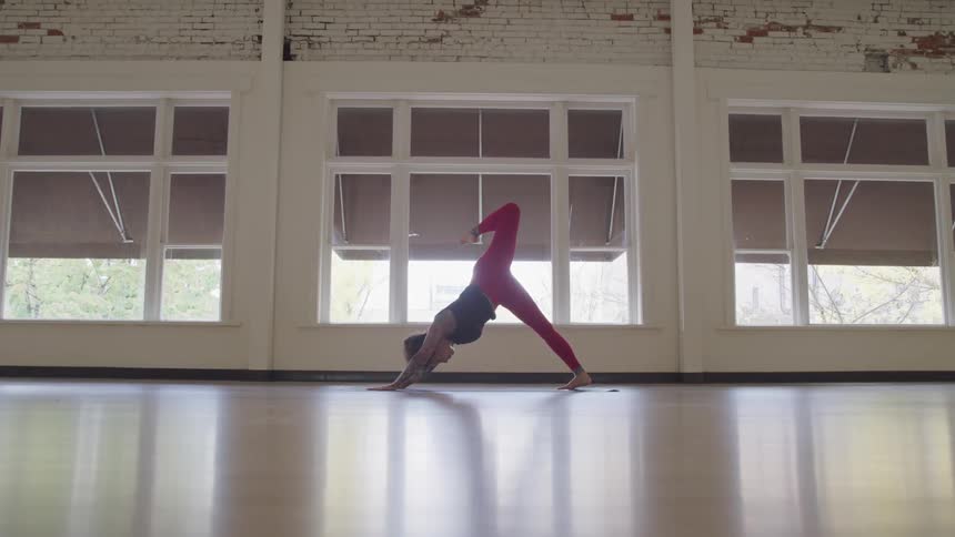 Woman stretching in a dance studio