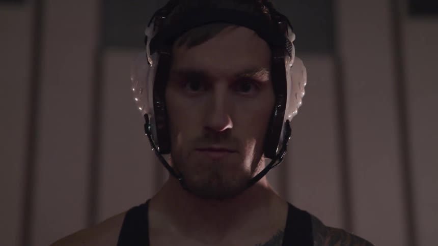 Man wearing headphones moves from side to side