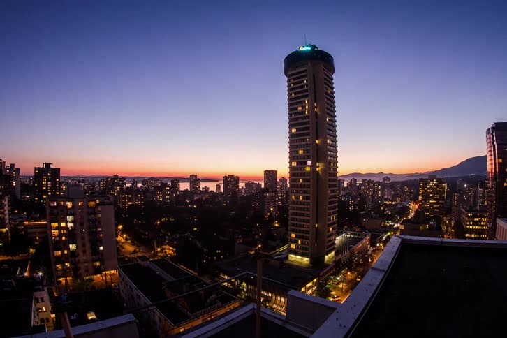 Time lapse of traffic and buildings in a downtown area