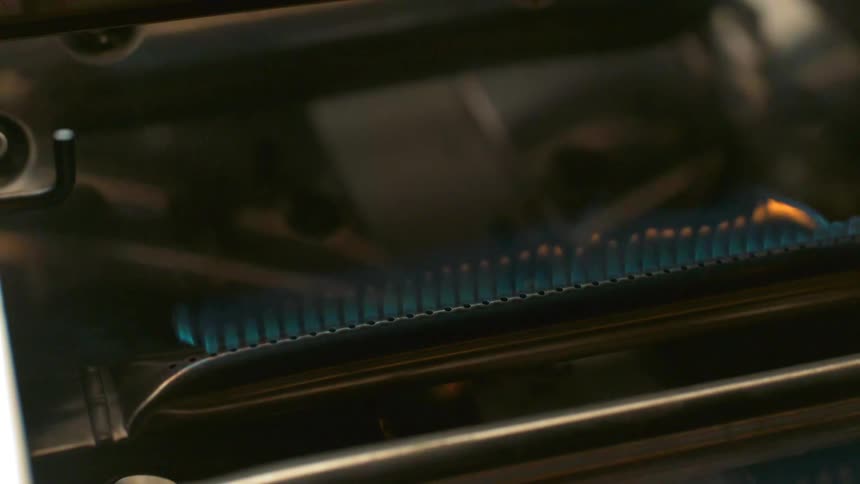 Flames burning on a gas stove