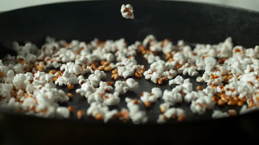 Popcorn popping in a pan