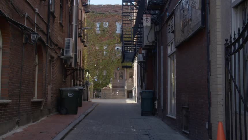 A street in between two buildings