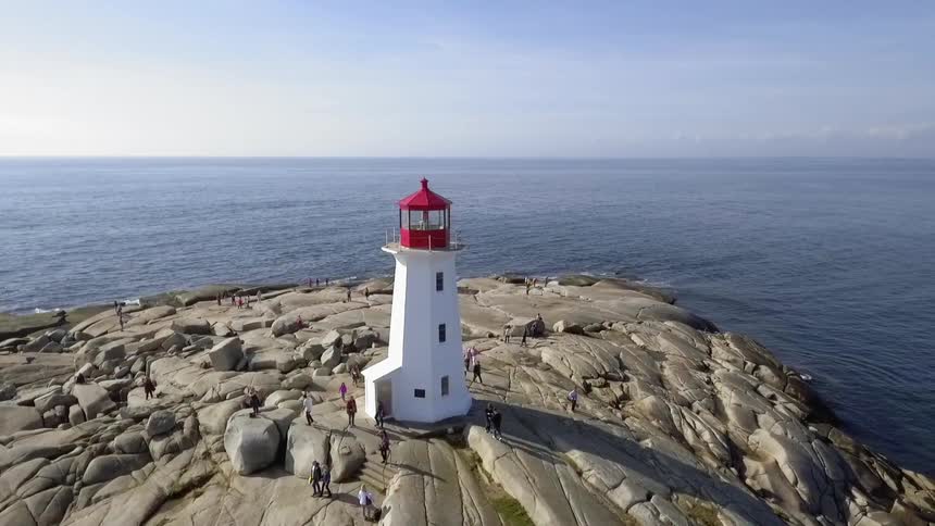 People tour around the large light house