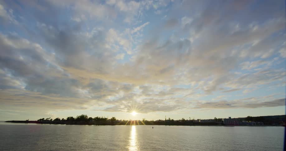 The sun over a quiet lake