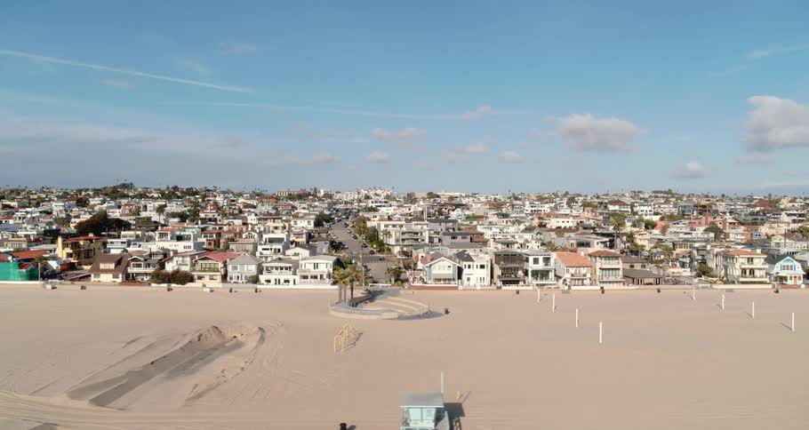 Aerial view of a beach front neighborhood on a clear day