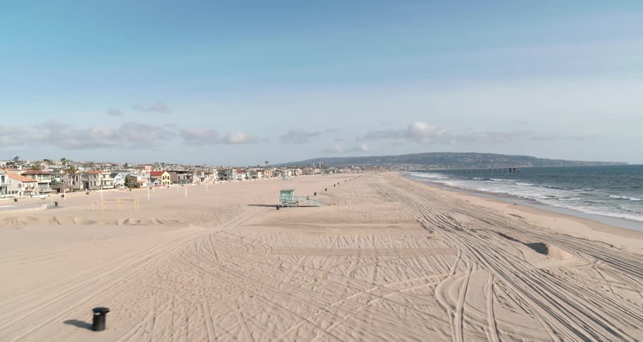 Aerial view of coastal city and an empty beach due to the lockdown caused by the coronavirus