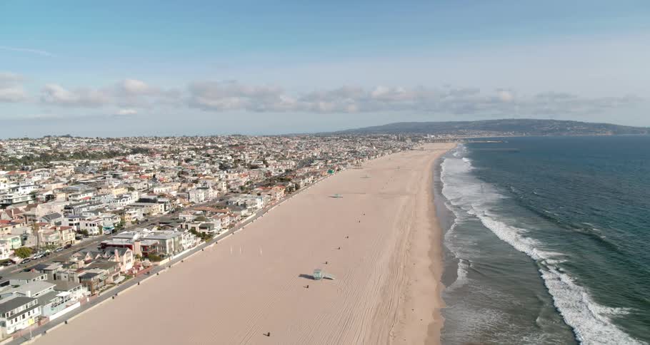 Aerial view of the sand beach and coastal city