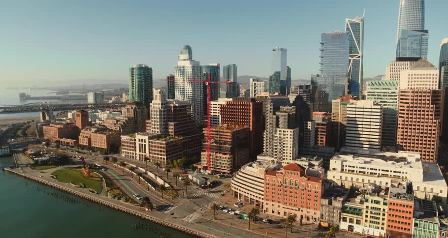 The waterfront and pier in front of a downtown area